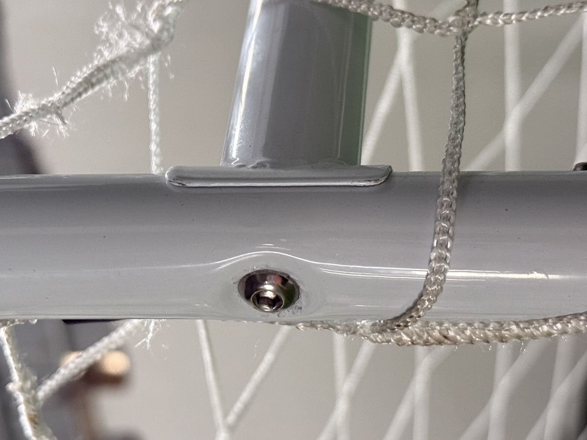 Powder-coated tube joint close-up